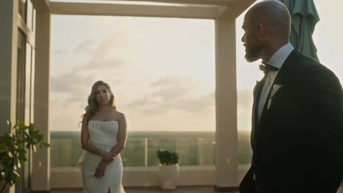 Couple in late afternoon on a terrace above the Pacific